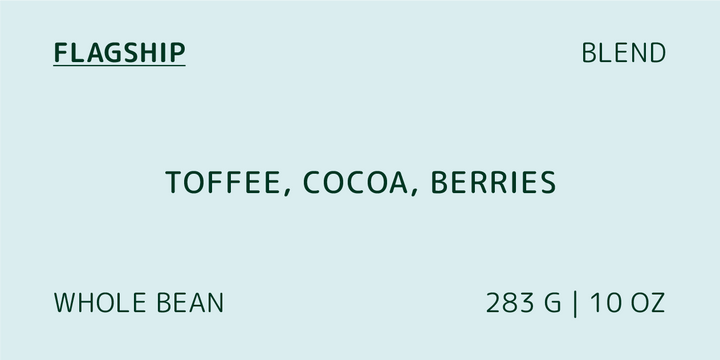 Image of coffee packaging labeled 'Flagship Blend' with flavor notes 'TOFFEE, COCOA, BERRIES' and 'WHOLE BEAN 283G | 10oz' on the front.