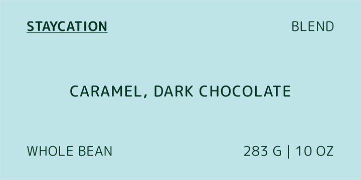 Product image for Staycation Blend coffee featuring caramel and dark chocolate flavors, indicating whole bean coffee and 283g weight.